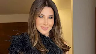 الأسود يليق بها.. نانسي عجرم بفستان جريء