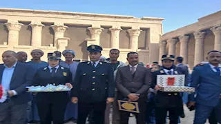 بالصور- آثار إدفو تحتفل بعيد الشرطة وتستقبل السياح بالورود