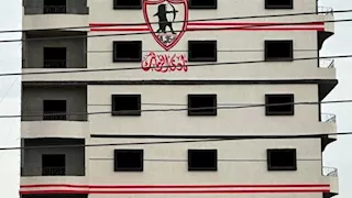 مواطن بالشرقية يدهن برجه السكني بألوان الزمالك: "شقة هدية لأي لاعب يحقق بطولـة" -صور