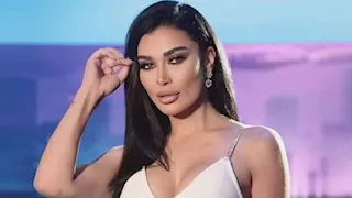 نادين الراسي بلوك أنيق ومكياج جذاب.. كيف أطلت؟