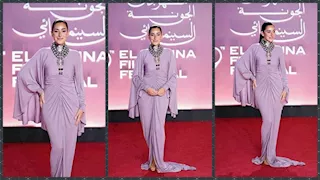 أمينة خليل بفستان من فالنتينو يتجاوز سعره 549 ألف جنيه في سابع أيام الجونة