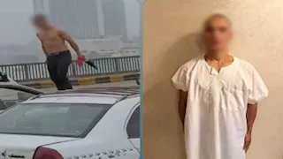شاب يتجرد من ملابسه ويعتلي سيارة أثناء سيرها بالجيزة 