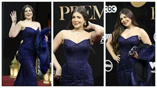 ملك قورة تخطف الأنظار بفستان أزرق أنيق في حفل المتحدة (صور)