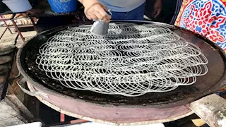 الكنافة والقطايف البلدي "تخطف الأنظار" في أسوان.. والأسعار تبدأ من 40 جنيهاً