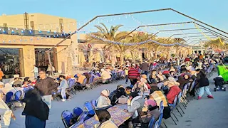 مسلمون ومسيحيون في أكبر إفطار جماعي ببورفؤاد - فيديو وصور