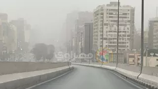 بالصور.. عاصفة ترابية تضرب القاهرة والجيزة 
