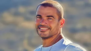 عمرو دياب يعلن  تأجيل حفله الغنائي في دبي