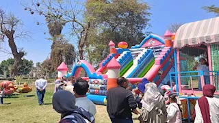 فرحة الأطفال بتبدأ من هنا.. الملاهي الشعبية تخطف الأنظار في القناطر الخيرية -صور