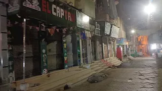 بالصور ـ أسيوط تشمع 37 محلًا مخالفًا لمواعيد الغلق