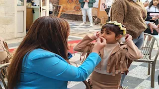 تيجان وصلبان من السعف تزين كنيسة الأنبا بيشوي في بورسعيد- (فيديو وصور) 