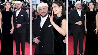 بالصور- جون ترافولتا يخطف الأنظار مع ابنته في مهرجان كان السينمائي
