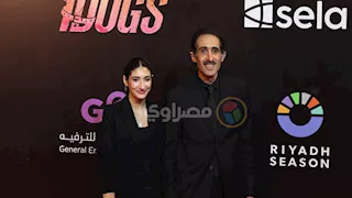 بالصور- لحظة وصول مجدي الجلاد بصحبة ابنته لميس العرض الخاص لـ "7 Dogs"