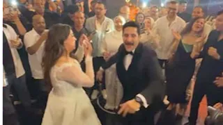 مصطفى منصور وهايدي رفعت يرقصان في حفل زفافهما.. شاهد الصور