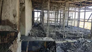   كواليس معاينة النيابة الإدارية لحريق عقار معهد الاتصالات بسوهاج