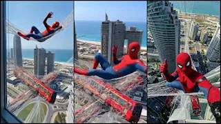 فيديو وصور.. الرجل العنكبوت على أبراج العلمين الجديدة استعدادا لعرضه بالسينمات