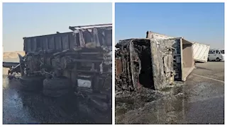 "النيران حاصرتهما داخل الكابينة".. مصرع شخصين في تصادم شاحنتين بالسويس (صور)