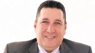 عماد الصايغ أول عميد كلية من ذوي الهمم بجامعة الأزهر