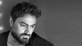 تامر حسني عن كليب "عايزك توعديني": "مشاعر صادقة من أب لبنته" - فيديو