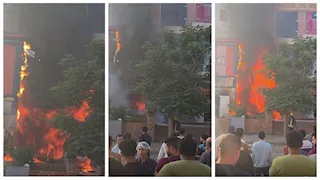 النار بدأت من محل كشري.. السيطرة على حريق مول الزهور بالسادات - صور