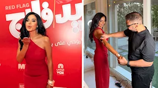 بالصور.. نسرين أمين تتألق بفستان في العرض الخاص لـ"ريد فلاج"